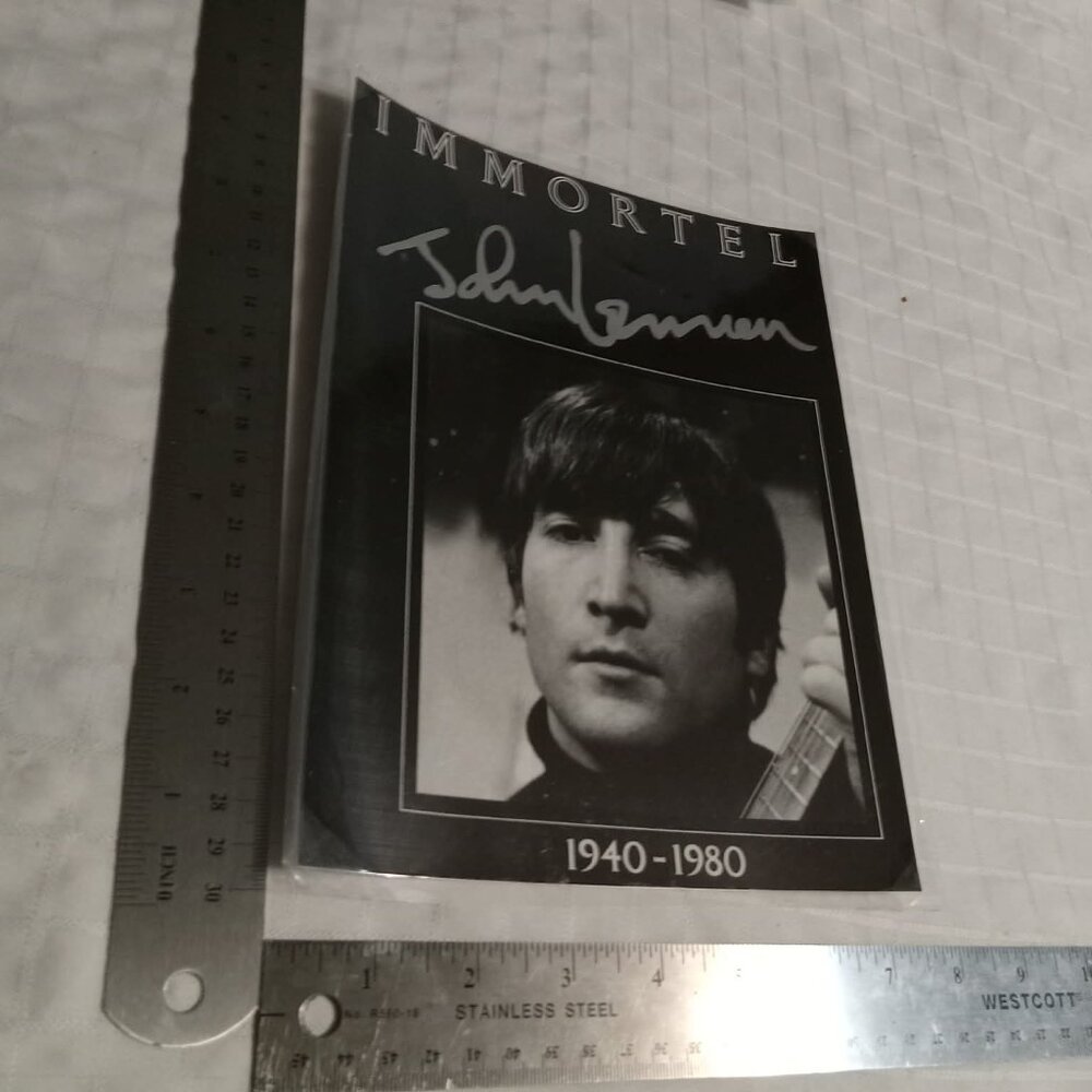 No4 : Eleven  (11) laminated in plastic posters featuring the Beatles